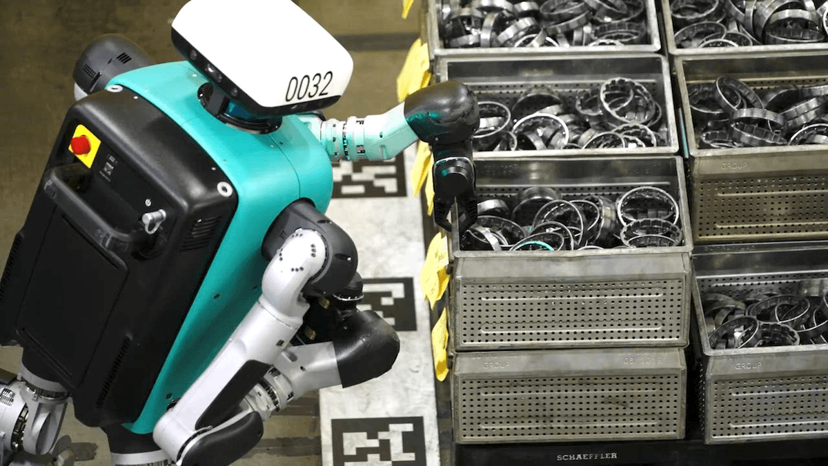 Humanoid Robots Work Factory Floors: Agility Digits humanoid robots fetch and carry bins at a Schaeffler auto-parts factory, displacing humans into higher-level jobs